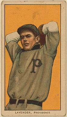 A baseball-card image of a man in an old-style gray baseball jersey and cap with his arms raised above his head