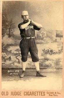 Joe Quinn posing in a Boston Beaneaters uniform.