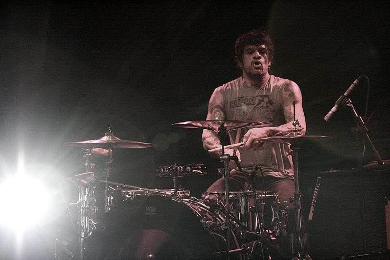 Joey Castillo playing with the Eagles of Death Metal at the Commodore Ballroom in July of 2009.jpg