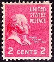 Historical 2-cent stamp with John Adams’s profile.