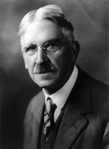 Bust portrait of John Dewey, facing slightly left.