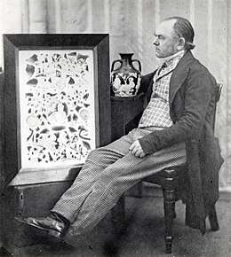 Black and white photograph of John Doubleday with the Portland Vase and an 1845 watercolour by Thomas H. Shepherd showing the shattered fragments