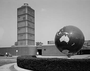 The Johnson Wax building with a large globe in the foreground
