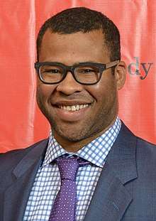 A photograph of Jordan Peele attending the Peabody Awards in 2014