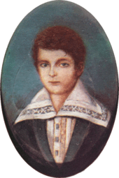 Half-length portrait of a boy with light hair and wearing a jacket over a shirt with an enormous, embroidered collar.