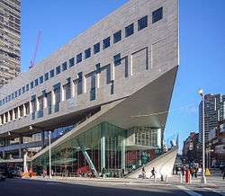 A picture of the Alice Tully Hall building at the Juilliard School in New York City, taken from across the street