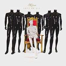 An image of a white mannequin wearing a crown sits on a throne while surrounded by a group of black, headless mannequins.