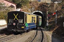 Train entering a tunnel