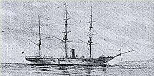 Side view of a three-masted ship with a smokestack on a flat sea.