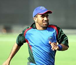 Cricketer Karim Sadiq, running and smiling