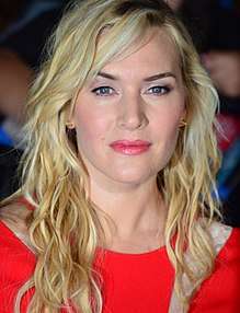 A close-up shot of Kate Winslet's face at the premiere of Divergent in 2014.