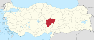 Kayseri highlighted in red on a beige political map of Turkeym