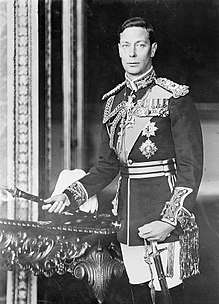  Man standing in royal regalia