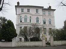 Large house in spacious grounds.