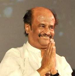 A picture of Rajinikanth making a salutation to the audience