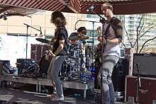 The band Kongos performs for a live audience.