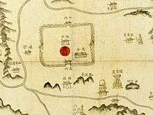 Old map made by hand-painting. Names of buildings and mountains are written in Chinese characters, and accompanied with small icons. On the center, 慶州 is put on a red circle.