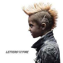 Kid with Mohawk wearing denim jacket with LFTF logo on his left scalp