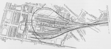 Map showing an elongated loop of tunnel beneath the tracks of the surface station and surrounding streets
