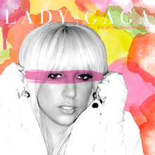 Lady Gaga's face, in black and white, against a colorful background of pink, yellow, red and green shapes