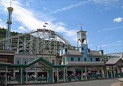 The main gate of Lake Compounce, with rides in the background