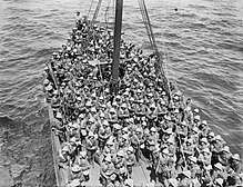 Lancashire territorials crammed on a boat deck as they land at Gallipoli