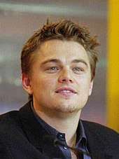A photograph of Leonardo DiCaprio attending a press conference for The Beach.