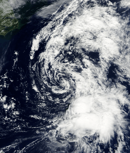 A satellite photo shows a large cloud to the southwest of Bermuda