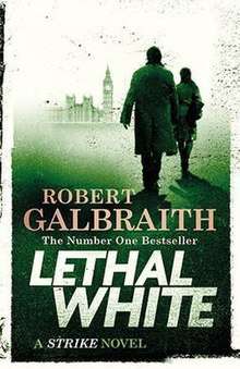 Lethal White UK cover. Color scheme is white, black, and green. Elizabeth Tower is in the background and the back of two figures, one male and one female, are in the foreground on the right.
