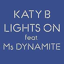 A blue background with the words "KATY B LIGHTS ON feat. Ms DYNAMITE" in white