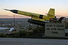 A Lockheed X-7 on display in the outdoor park.