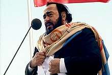 Colour photograph of Luciano Pavarotti performing live in 2003