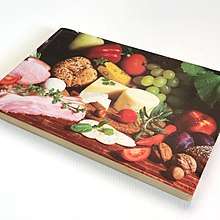 A printed sample on wooden board, depicting food items. Printed with the Lynx ULTRA 2513 flatbed UV printer