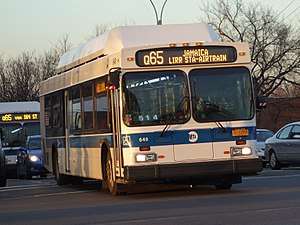A bus in Q65 service in Queens