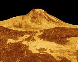 Image is false-colour, with Maat Mons represented in hues of gold and fiery red, against a black background
