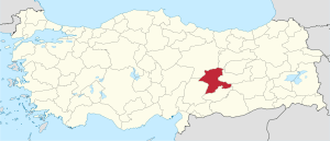 Malatya highlighted in red on a beige political map of Turkeym