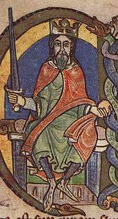 Coloured illumination of a seated mediaeval king