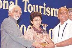 Malladi Krishna Rao receiving award from Vice President