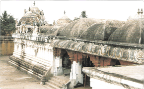 an image depicting a series of conical roofs of a temple