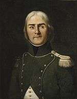 Painting of a man with light-colored hair and dark eyebrows wearing a blue military uniform in 1792.