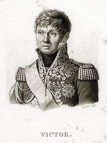 Black and white print shows a clean-shaven round-faced man. He wears a dark military uniform of the early 1800s with epaulettes, a high collar and a lot of lace.