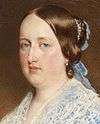 Painting showing the head and shoulders of a young woman wearing a lacey blue dress with auburn hair pulled back
