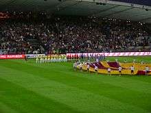 Maribor and Birmingham City players line up moments before the start of their 2011–12 Europa League match.