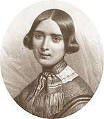 young white woman, with dark hair, in early 19th century dress