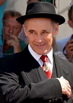 A photograph of Mark Rylance smiling at the 2016 Cannes Film Festivial