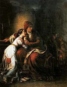 Middle-aged woman holding a young woman in her arms
