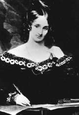 Black-and-white half-length portrait of a woman in a dress
