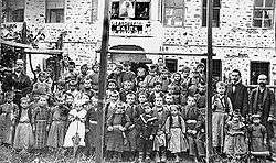 First officially recognized Albanian school for boys, Korçë, 1899. Director Nuçi Naçi, teachers Thanas Nona and Kristo Vodica, and students