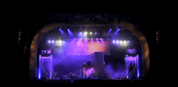 Oval stage, with blue lights and smoke