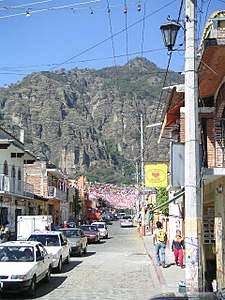 A color picture of a mountain from town